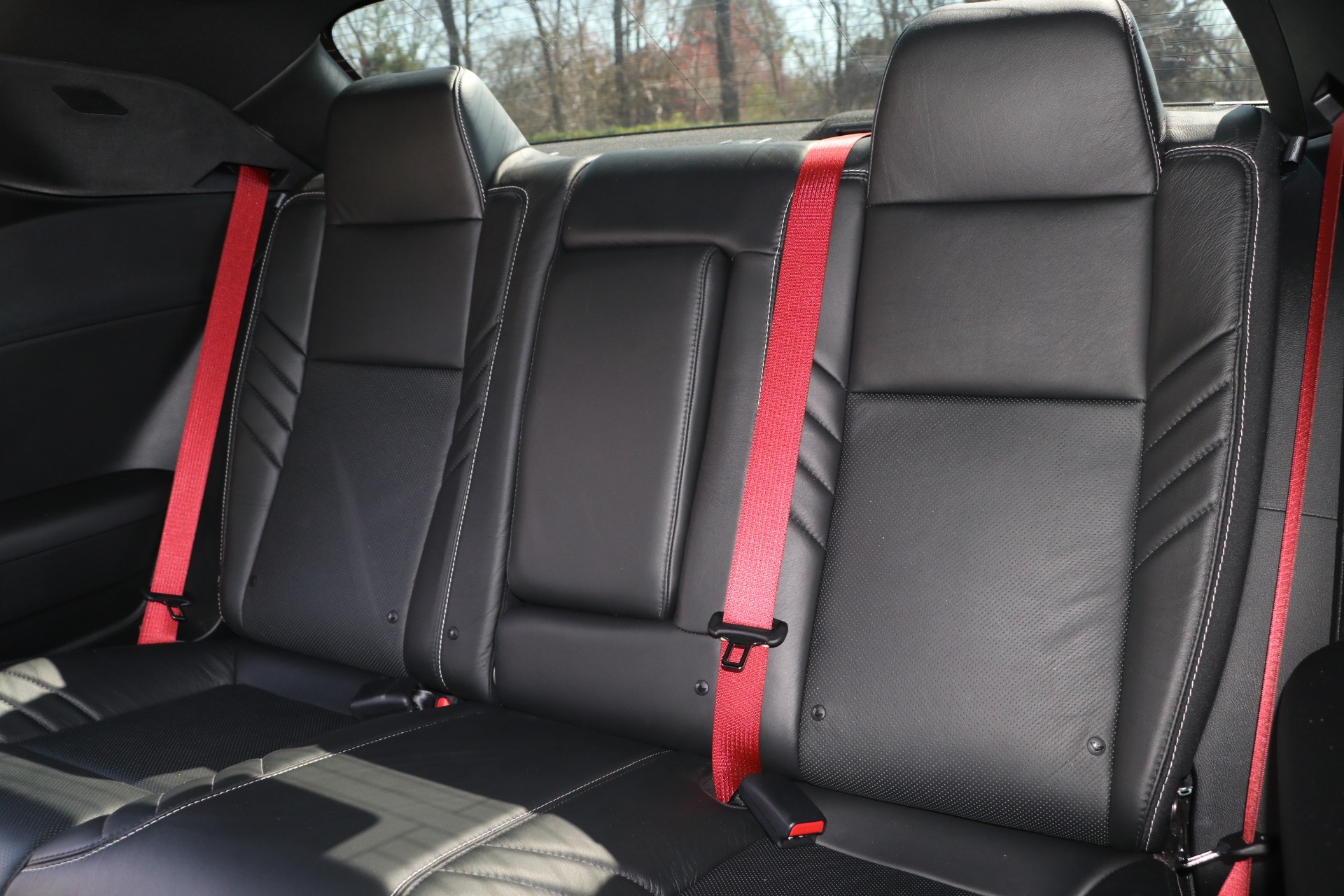 Challenger red clearance seat belts